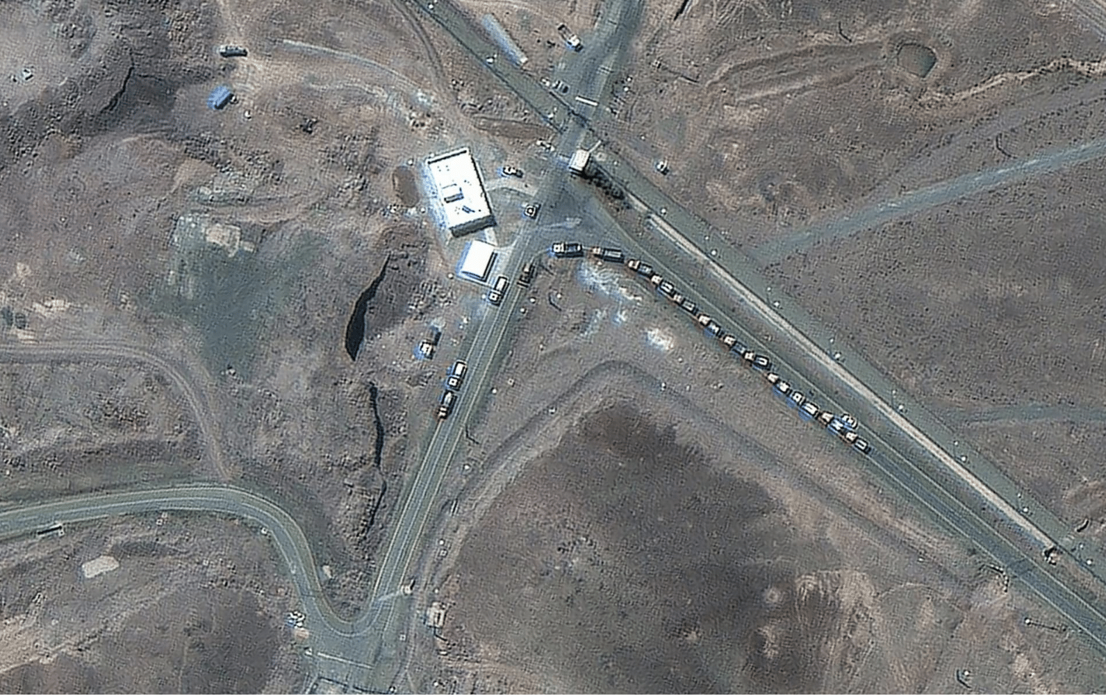 Satellite images reveal line of trucks at Fordow before strikes suggesting uranium may have been removed before strike